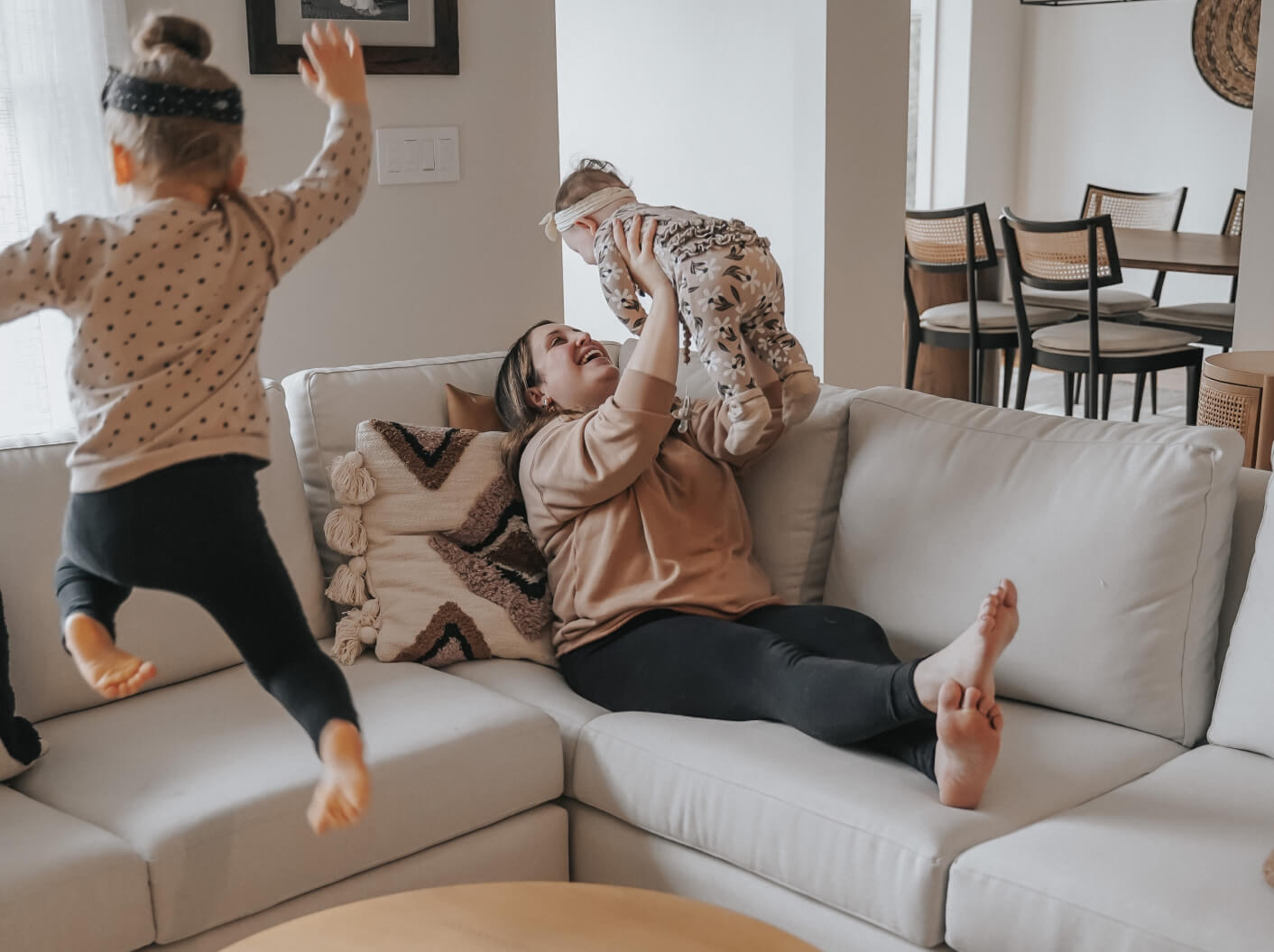 Woman and her children on Rio Corner Sectional